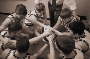Basketball Team in Huddle
