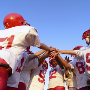 Team Huddle Before the Game --- Image by © Royalty-Free/Corbis